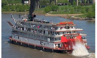 DELTA QUEEN, approaching a bridge with funnel lowered, has not sailed since 2008. © Delta Queen Steamboat Company