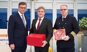 Gift from the Port of Zeebrugge by Mr. Joachim Coens, Chairman, to CEO UECC Mr Glenn Edvardsen and to the master Captain Henryk Laskowski. Gift from the Port of Zeebrugge by Mr. Joachim Coens, Chairman, to CEO UECC Mr Glenn Edvardsen and to the master Captain Henryk Laskowski.