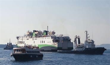 OLYMPUS seen leaving Santorini for Syros under tow © Capt. Nick Damigos